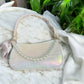 Andie Crocodile Iridescent Handbag with Pearl Chain and Chic Bow